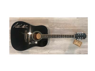 Win a Nathaniel Rateliff Autographed Guitar